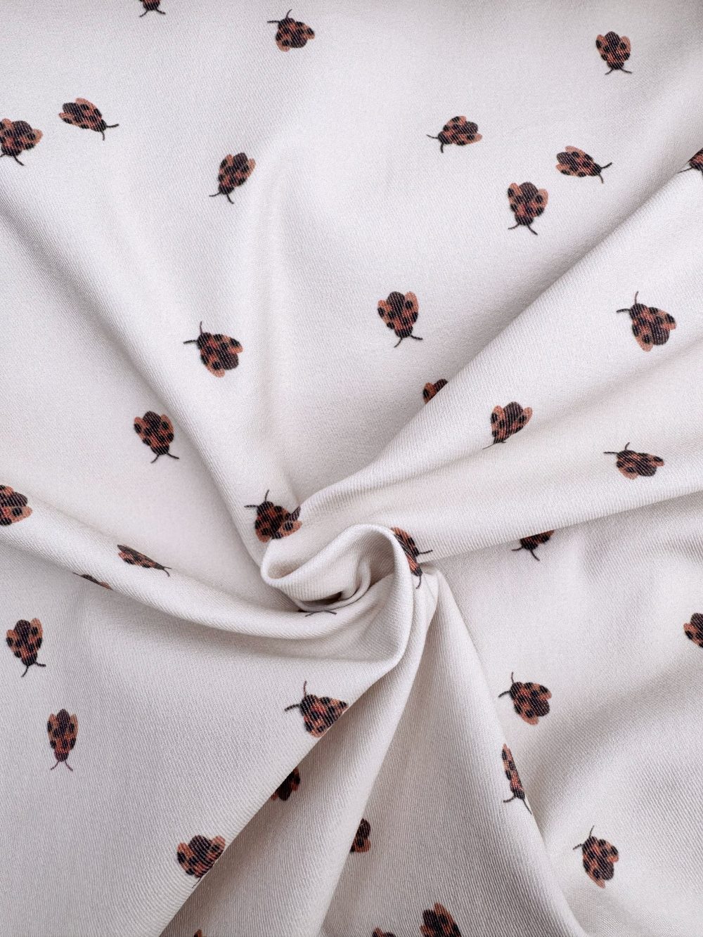 Ladybugs op denim