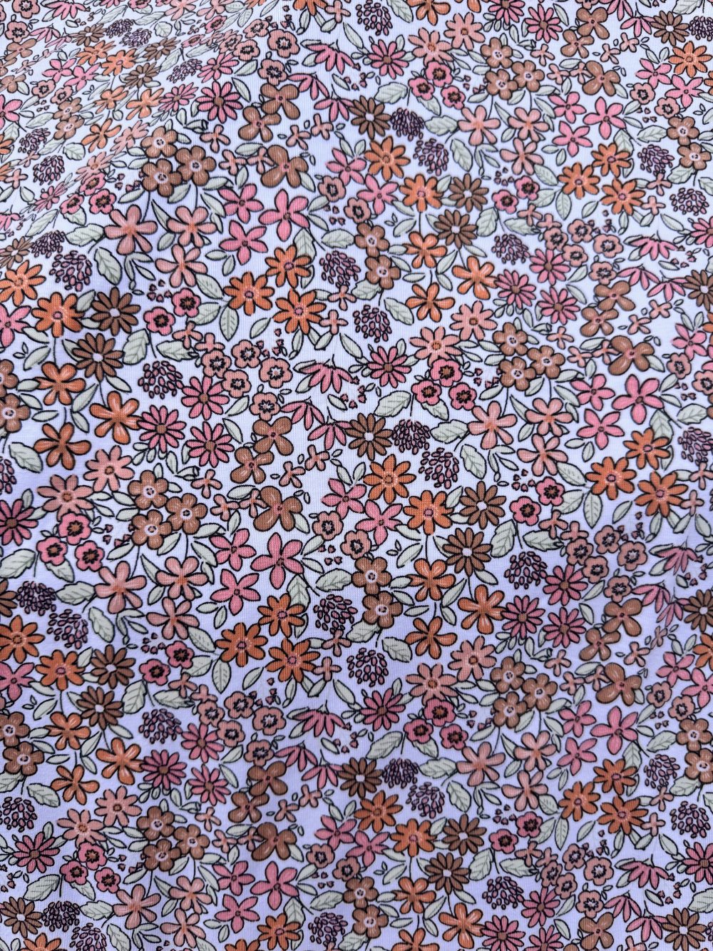 Rainbow Bloom – Jersey met Kleurrijke Bloemetjes